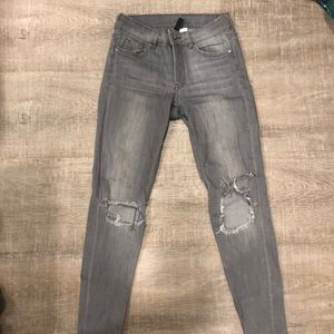 grey ripped jeans